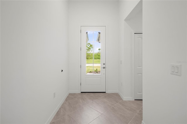 doorway featuring light tile patterned floors