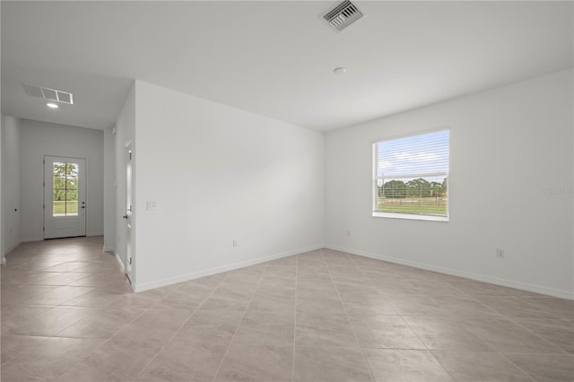 view of tiled spare room