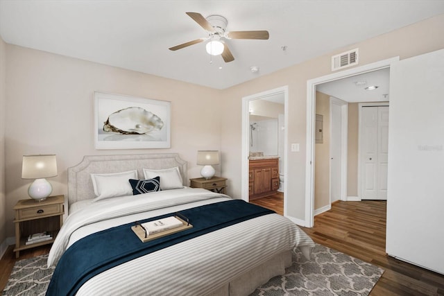 18106 Peregrines Perch Pl Unit 5204, Lutz, FL 33558 - bedroom with dark wood finished floors, baseboards, ceiling fan, and electric panel