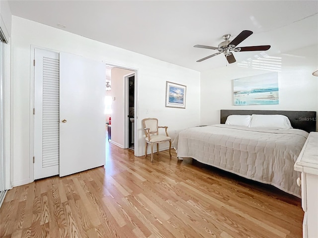 bedroom featuring light wood-type flooring and ceiling fan