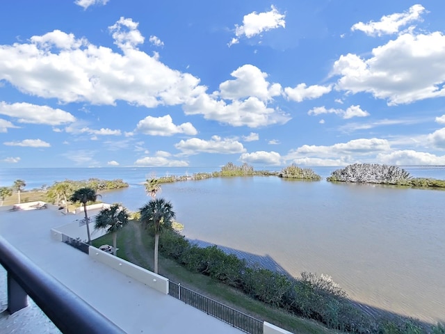 view of water feature with fence