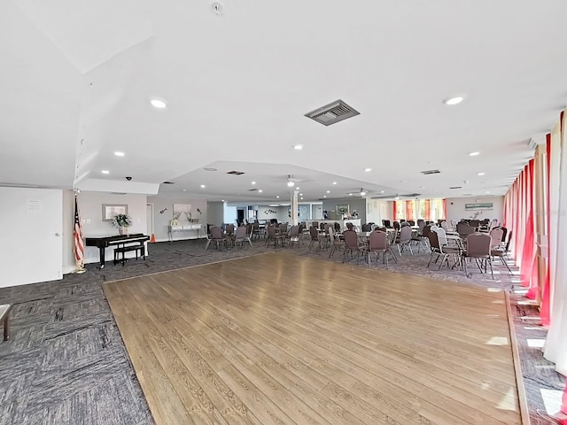 interior space featuring ceiling fan, visible vents, wood finished floors, and recessed lighting