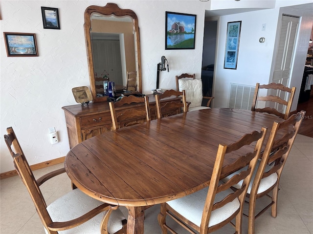 view of tiled dining room