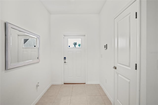 entryway featuring light tile patterned floors