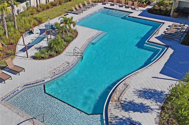 view of pool featuring a patio area