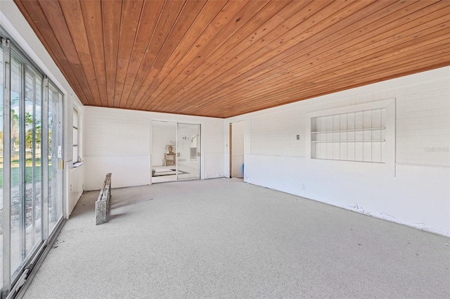 unfurnished room featuring wood ceiling