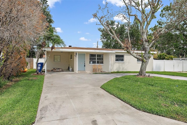 4145 Harrisburg St NE, Saint Petersburg, FL 33703 - single story home featuring concrete driveway and a carport
