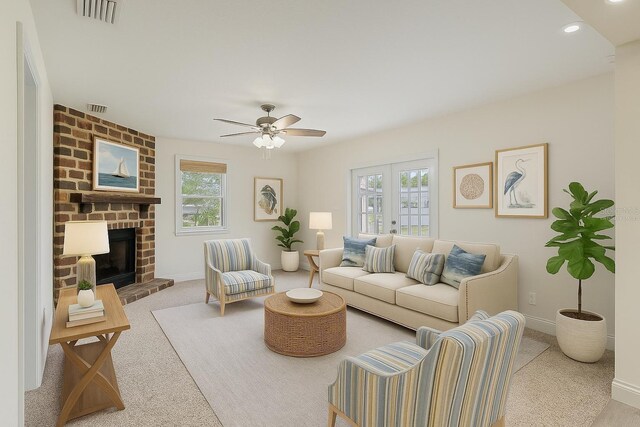4145 Harrisburg St NE, Saint Petersburg, FL 33703 - carpeted living area with baseboards, plenty of natural light, a ceiling fan, a fireplace, and recessed lighting