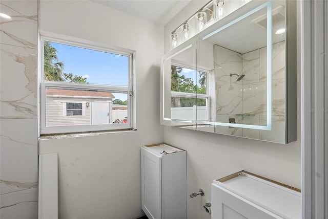 4145 Harrisburg St NE, Saint Petersburg, FL 33703 - full bathroom with a marble finish shower