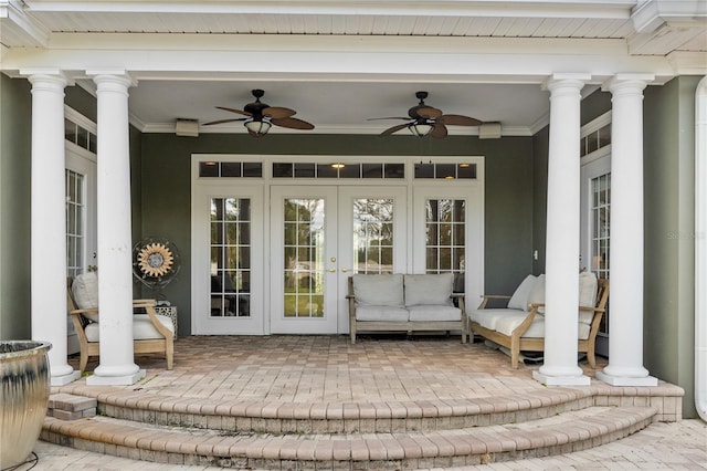 property entrance featuring french doors and ceiling fan