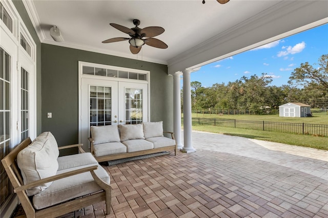 view of patio with french doors and ceiling fan