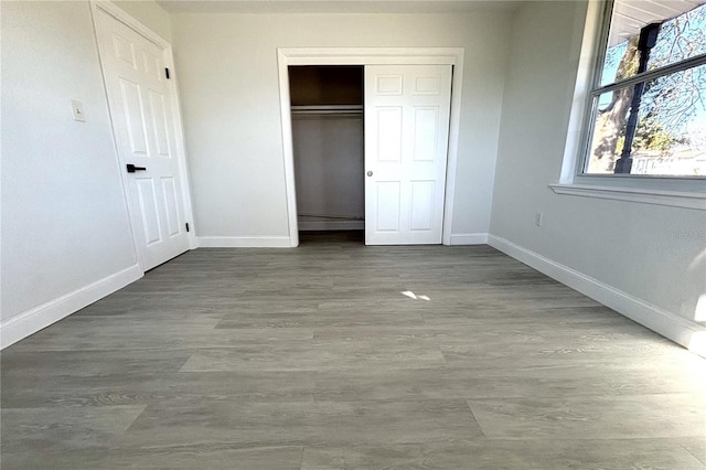 unfurnished bedroom featuring a closet