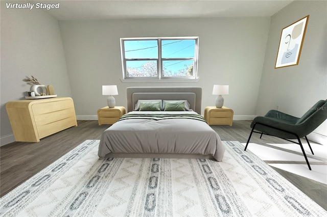 bedroom with wood-type flooring