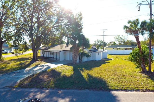 ranch-style house with a front yard