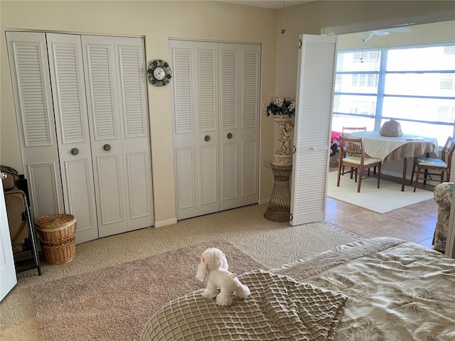 bedroom featuring two closets