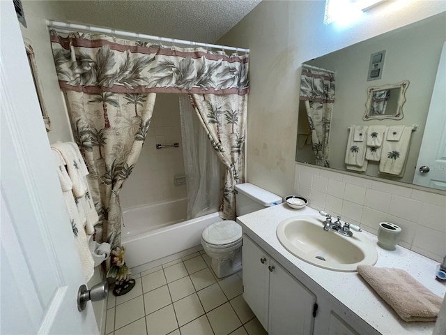 full bathroom with shower / tub combo, tasteful backsplash, a textured ceiling, tile patterned flooring, and toilet