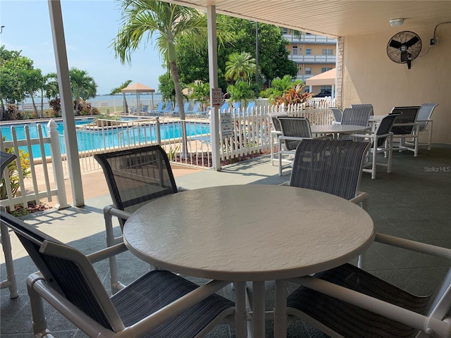 view of patio featuring a community pool