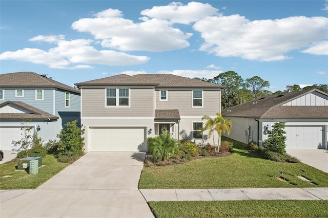 view of front of property featuring a garage and a front lawn