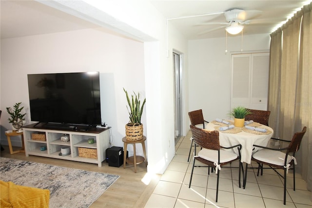 dining room featuring ceiling fan and light hardwood / wood-style floors