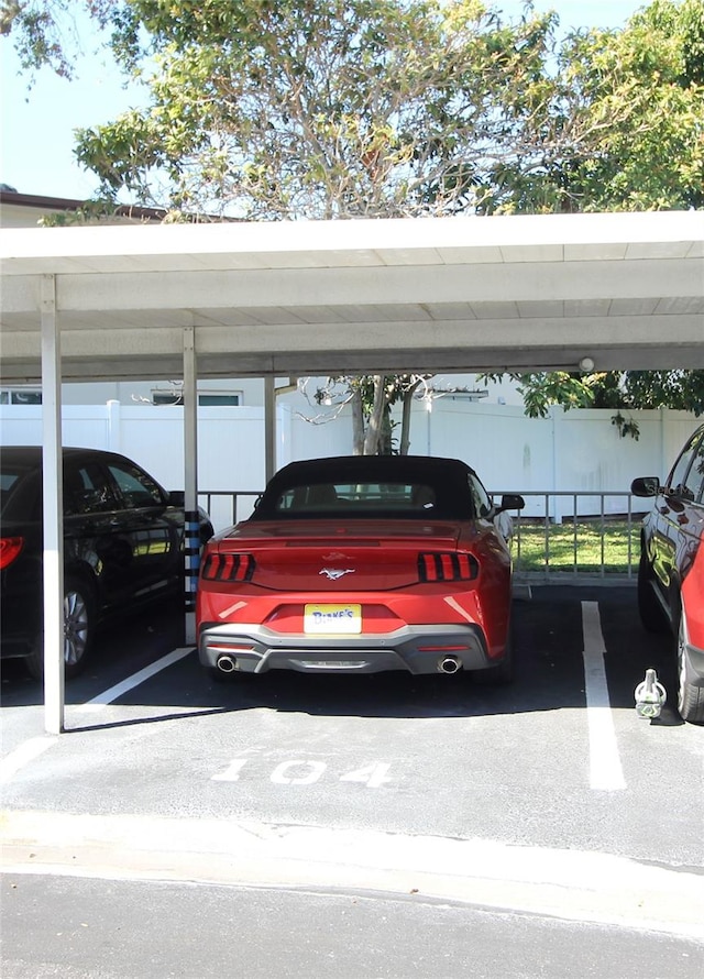 view of parking with a carport