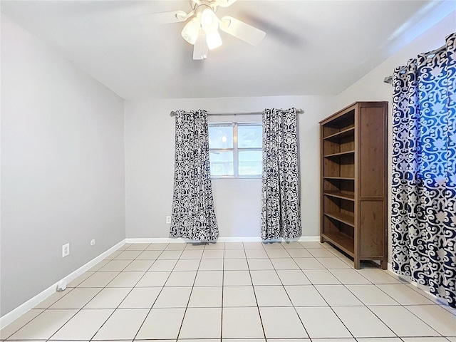 empty room featuring ceiling fan