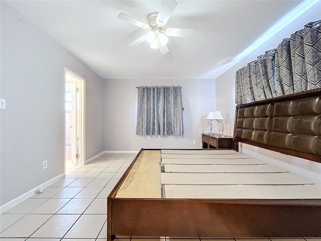 bedroom featuring ceiling fan and light tile patterned floors