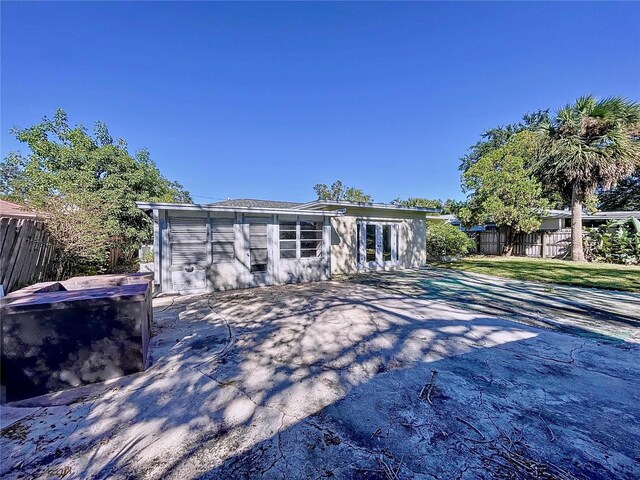 back of property featuring a patio