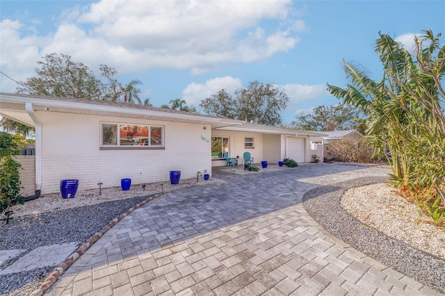 view of front of property featuring a garage