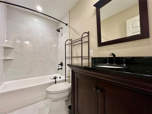 full bathroom with vanity, tiled shower / bath combo, and toilet