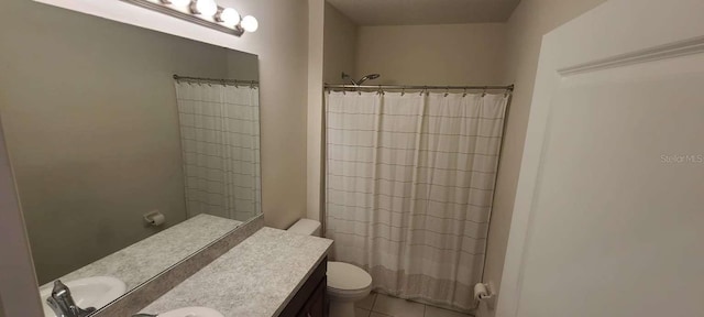 bathroom featuring vanity, toilet, curtained shower, and tile patterned flooring