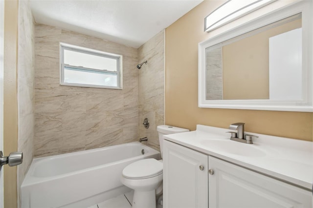 full bathroom with tile patterned floors, vanity, toilet, and tiled shower / bath