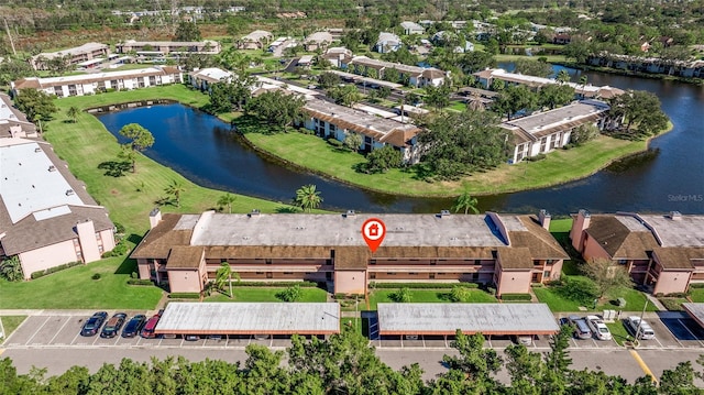 aerial view featuring a water view and a residential view