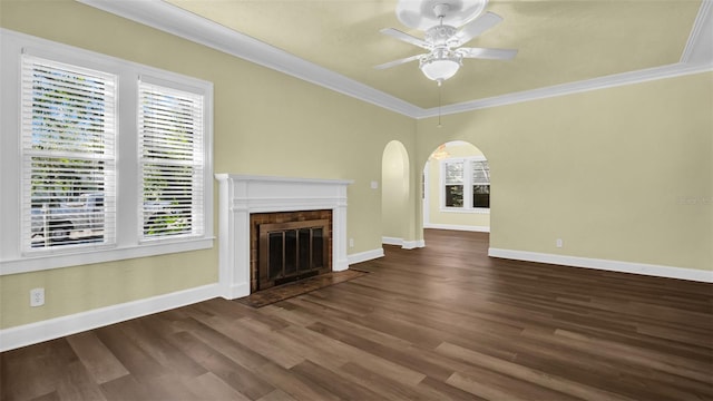 unfurnished living room featuring dark hardwood / wood-style flooring, plenty of natural light, and ceiling fan