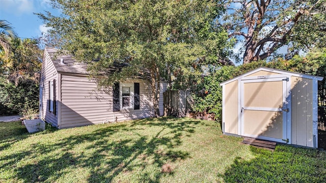 view of yard with a storage shed