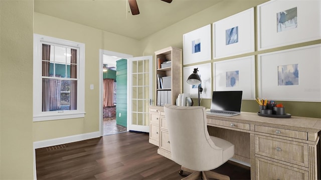 office space with dark wood-type flooring