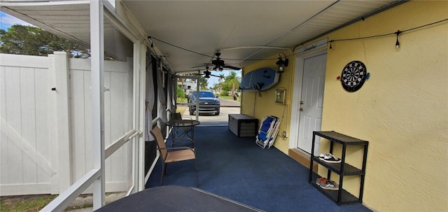 view of patio / terrace featuring ceiling fan