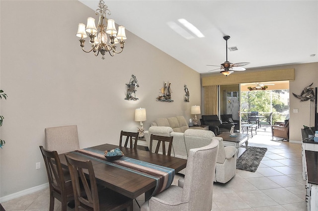 dining room featuring light tile patterned floors, ceiling fan with notable chandelier, and lofted ceiling