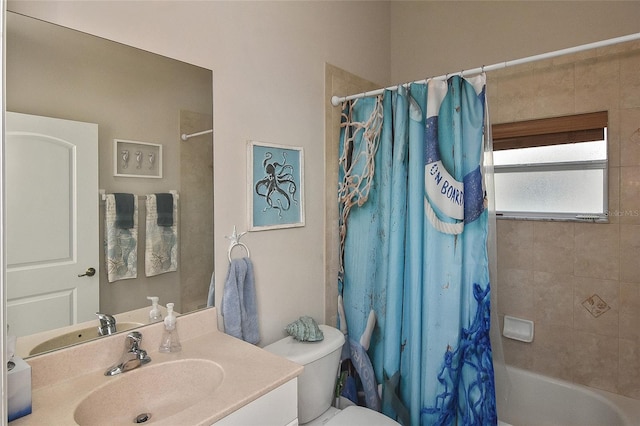 full bathroom featuring vanity, toilet, and shower / tub combo