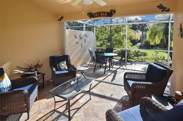 sunroom / solarium with ceiling fan