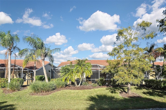 view of yard with a lanai