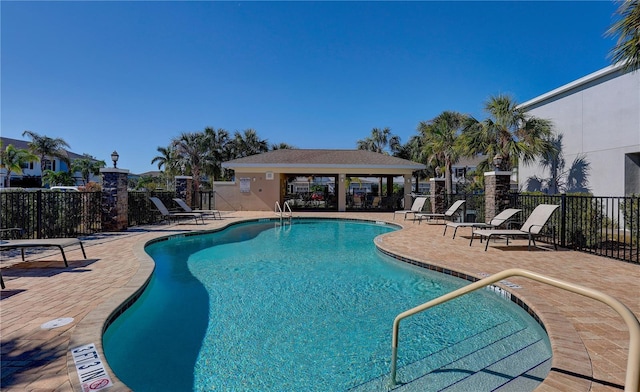 view of pool with a gazebo and a patio area