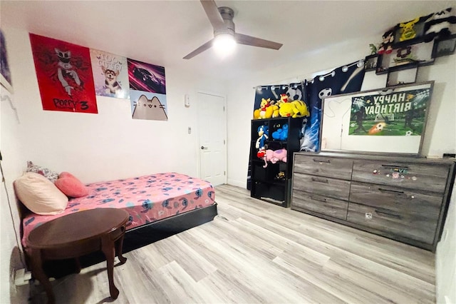 bedroom featuring ceiling fan and light wood-type flooring