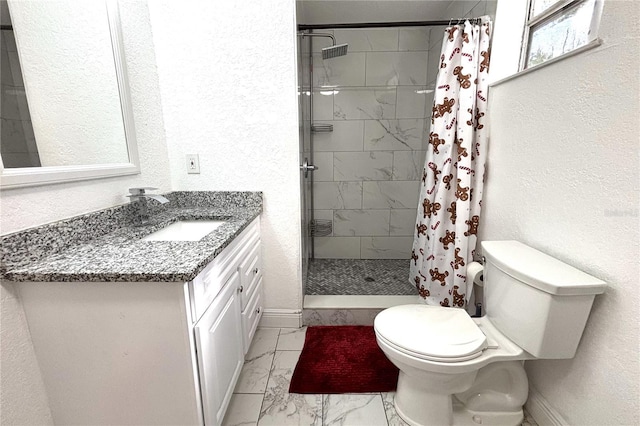 bathroom with a shower with shower curtain, vanity, and toilet