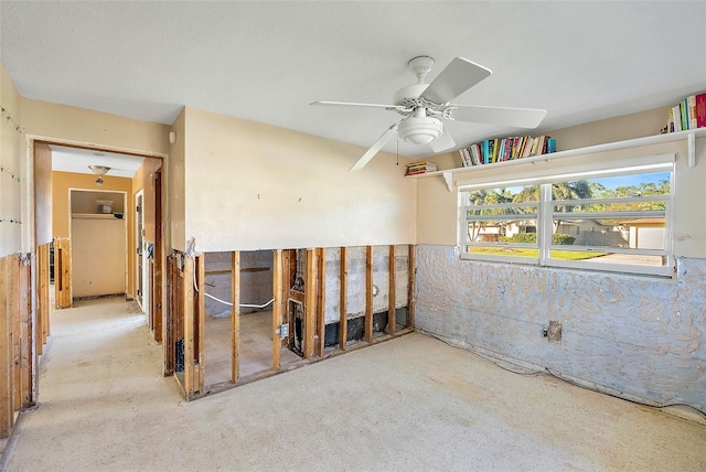 unfurnished room featuring ceiling fan