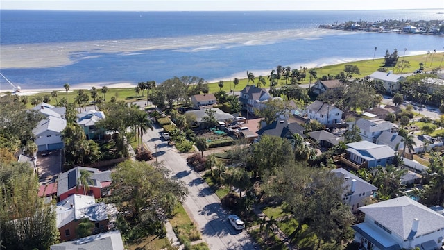 aerial view featuring a water view and a beach view