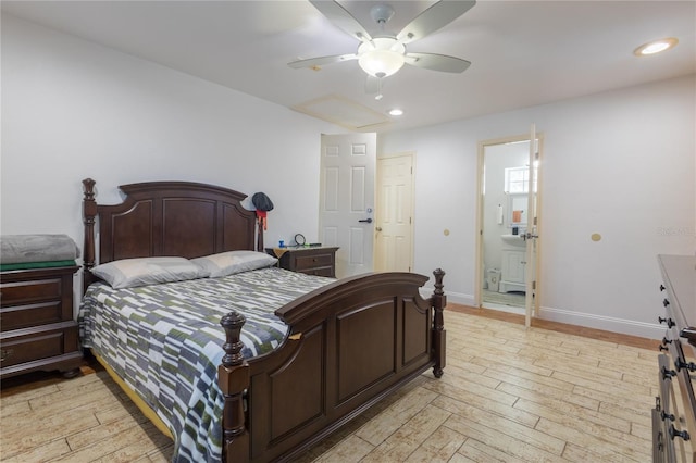 bedroom featuring ensuite bath, ceiling fan, and light wood-type flooring