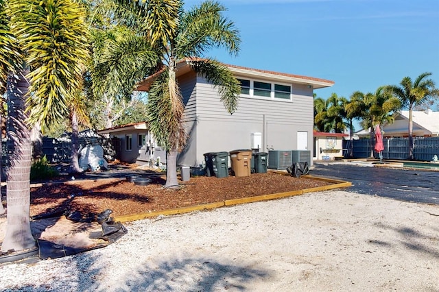 view of property exterior with cooling unit