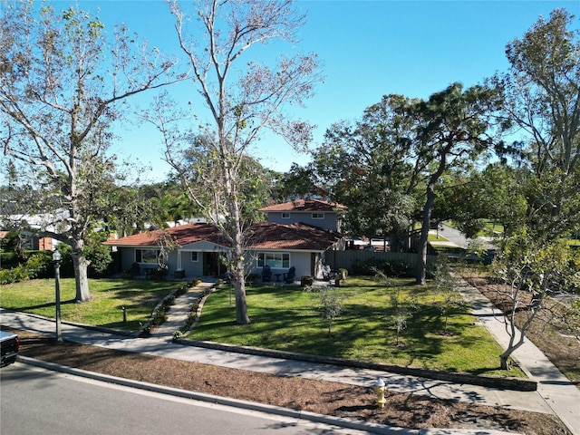 view of front of home featuring a front lawn