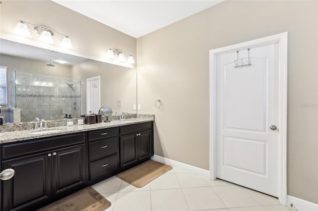 bathroom with vanity, tile patterned floors, and an enclosed shower