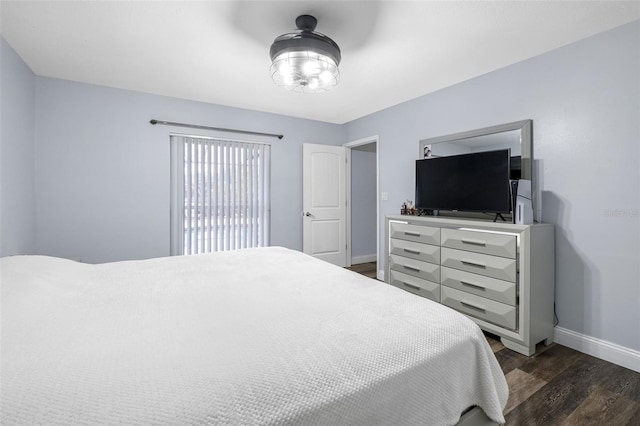 bedroom featuring dark hardwood / wood-style floors